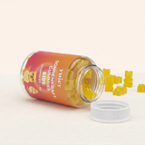 Kids Sonnenkraft Gummies - Dose liegt umgekippt und Gummibärchen fallen heraus